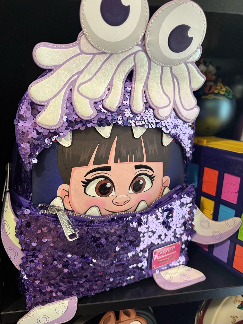 Monsters Inc. Purple Sequin Boo Backpack with Character Detail